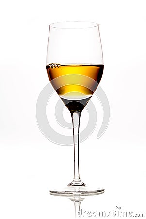 Glass of amber coloured wine or sherry Stock Photo