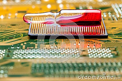 Glass ampoule for vaccination implantation processor chip implantation for surveillance. Stock Photo