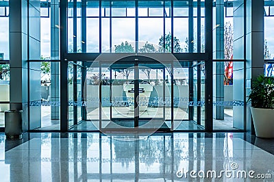 Glass automatic sliding doors entrance. Stock Photo