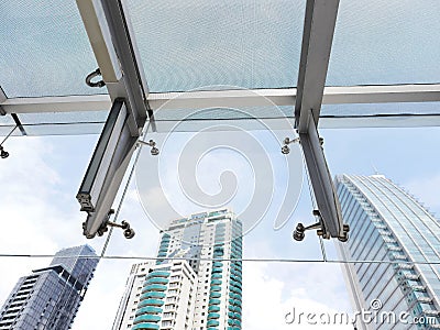 Glass awning and roof of outdoor corridor Stock Photo