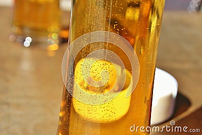A glass of beer and an ashtray. Stock Photo