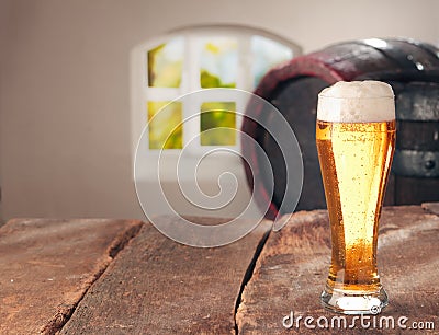 Glass of beer and a cask Stock Photo