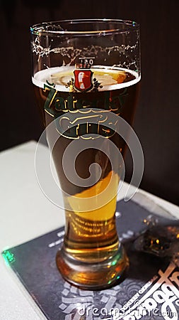 Glass of beer drink alcohol is on the table Editorial Stock Photo