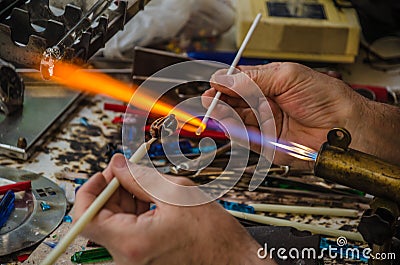 Glass blower work Stock Photo