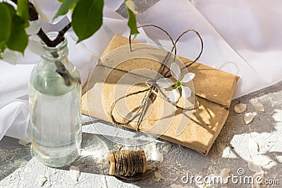 Glass bottle with blossoming branches of cherry Stock Photo