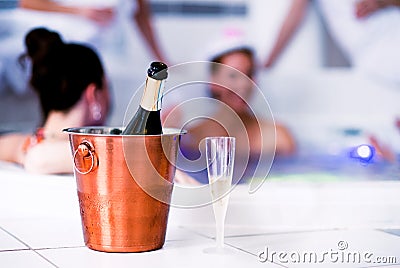 Glass and bottle of champagne in bucket, hen party Stock Photo