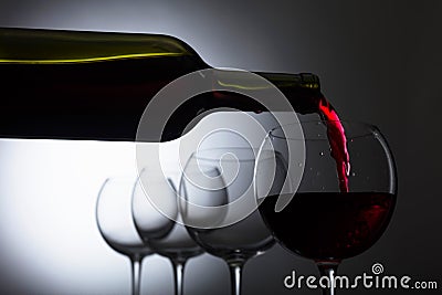 Glass and bottle of red wine. Stock Photo