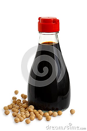 Glass bottle of soya sauce with red plastic lid isolated on whit Stock Photo