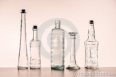 Glass bottles of various shapes Stock Photo
