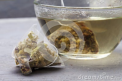 Glass bowl of healthy herbal tea with mint, hibiscus, Stock Photo