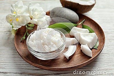 Glass bowl with natural coconut scrub Stock Photo