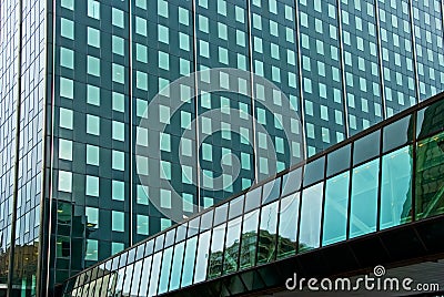 Glass building with enclosed walkway Stock Photo