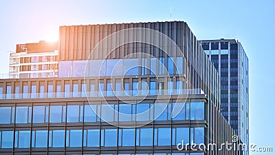 Glass building with transparent facade of the building and blue sky. Stock Photo