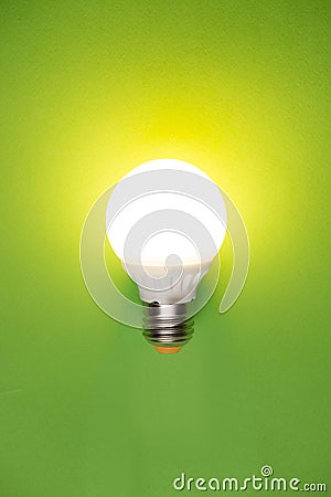 Glass bulbs for lampson green background - idea concept Stock Photo