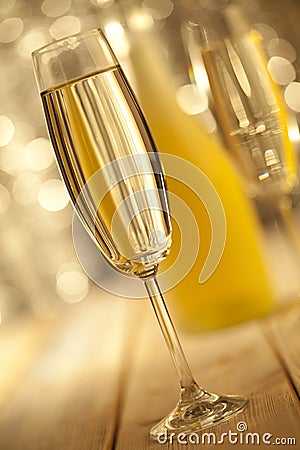 Glass of champage on bokeh background Stock Photo