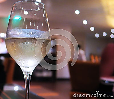 Glass of Chilled Wine Blurred Background Stock Photo