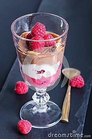 Glass of chocolate and rapsberry dessert Stock Photo