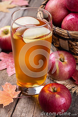 Glass of Cider With Apple Slices Stock Photo