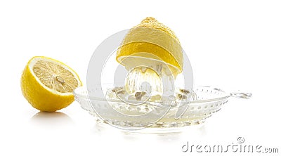 Glass citrus squeezer with lemons Stock Photo