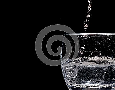 Glass of clear water with bubbles Stock Photo