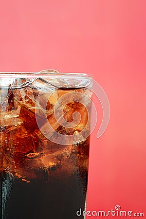 A glass of cola soft drink with ice cubes Stock Photo