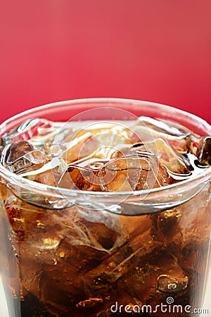 A glass of cola soft drink with ice cubes Stock Photo