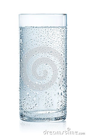 Glass of cold still water with drops Stock Photo