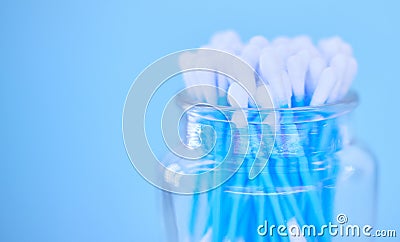 Glass container with cotton makeup cosmetic swab buds, self cleaning ear canal and environment recycle. Covid nasal test Stock Photo