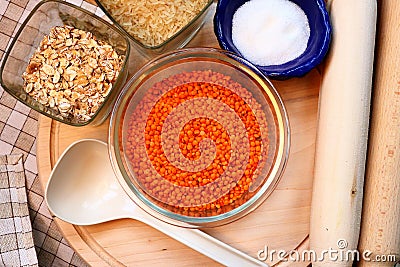 Glass container with lentils . Kitchen utensils. Lentils, oatmeal, rice and sugar Stock Photo