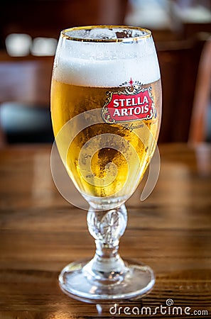 Glass containing stella artois pilsen style draft beer Editorial Stock Photo