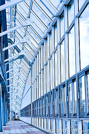 Glass corridor in office Stock Photo