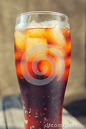 A glass covered with dew drops with a cold drink Stock Photo