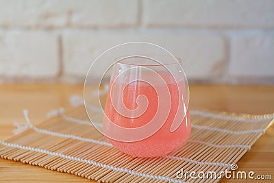 Glass cup on table with effervescent vitamins Stock Photo