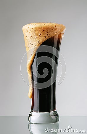 Glass of dark beer Stock Photo