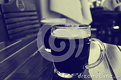 Glass of dark beer Stock Photo