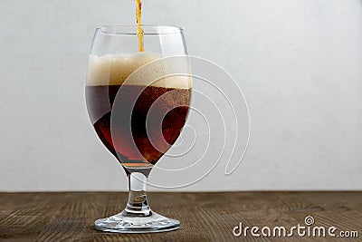 Glass of dark beer Stock Photo