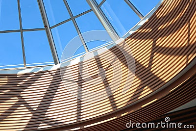 Glass dome constructions shadows in shopping mall in sunny day Stock Photo
