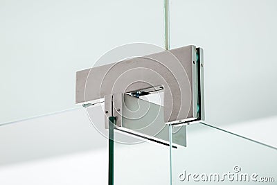 Glass door hinges metal fittings. Stock Photo