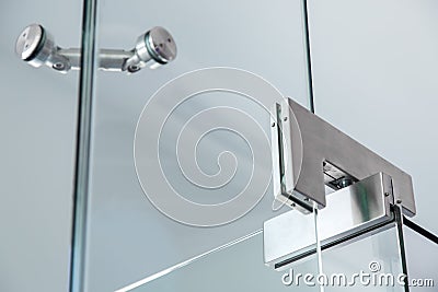 The glass door pivot hinge. Stock Photo