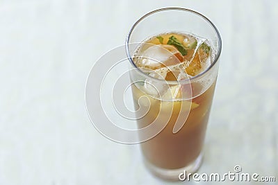 Glass of drink with fruits, ice and pimm's Stock Photo