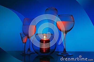 Glass fantasy with glasses and a candle Stock Photo