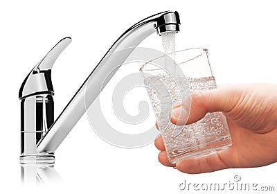 Glass filled with drinking water from tap. Stock Photo