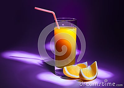 A glass of fresh orange juice with a straw and slices of orange. Violet background and darkening around the edges Stock Photo