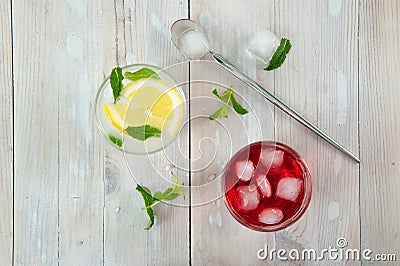 Glass glasses seen from above, with red and yellow iced cocktails Stock Photo