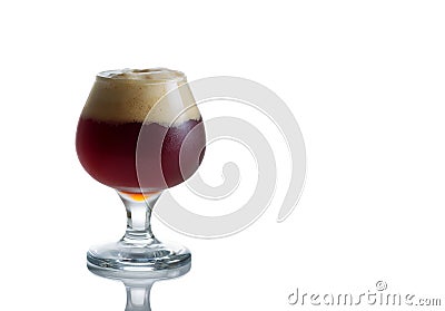 Glass Goblet filled with fresh Dark Beer on White Stock Photo