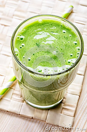 Glass of green smoothie, top view Stock Photo