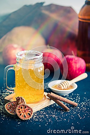 Glass of healthy bael tea with cinnamon, appel and honey Stock Photo