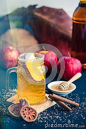 Glass of healthy bael tea with cinnamon, appel and honey Stock Photo