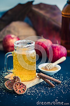 Glass of healthy bael tea with cinnamon, appel and honey Stock Photo