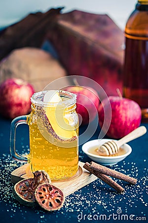 Glass of healthy bael tea with cinnamon, appel and honey Stock Photo